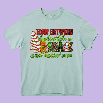 Torn Between Lookin' Like A Snack And Eatin' One Heavy Core Tee Designed By Ranaportraitstore