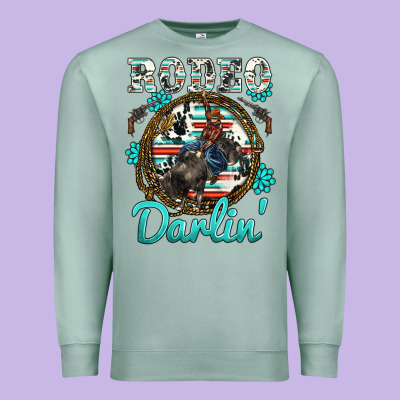 Western Rodeo Darlin' Bullfighter Serape Cowhide Turquoise Gemstones Premium Sweatshirt Designed By Barkaloodesign