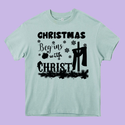 Christmas Begins With Christ Heavy Core Tee Designed By Bettercallsaul