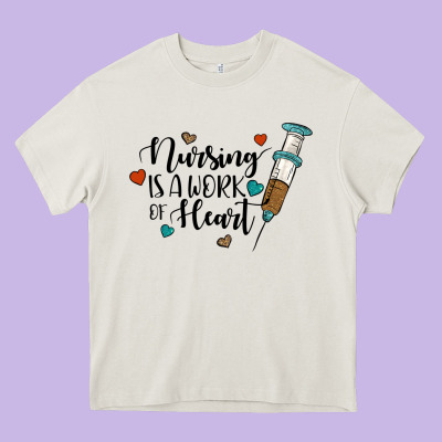 Nursing İs A Work Of Heart Heavy Core Tee Designed By Jahusdesignshop