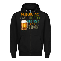 Black surviving fatherhood one beer at a  time Zipper Hoodie - Artiststas