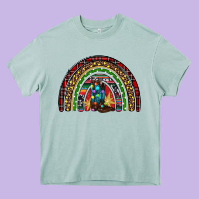 Christmas Cowboy Boots Rainbow Heavy Core Tee Designed By Ranaportraitstore