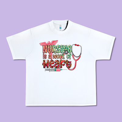 Nursing Is A Work Of Heart Urban Heavy Tee Designed By Cowgirlartshop