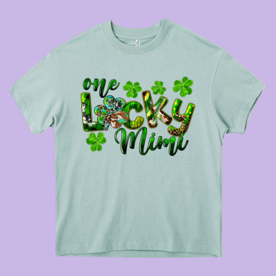 St. Patrick's Day One Lucky Mimi Heavy Core Tee Designed By Ranaportraitstore