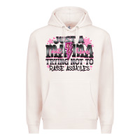Pale Pink Just a Mama Out Here Trying Not To Raise Assholes Premium Hoodie - CowhideDigitalArt
