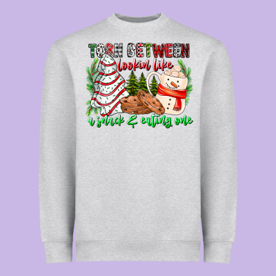 Torn Between Looking Like A Snack Eating One Heavyweight Sweatshirt Designed By Cowhidedigitalart