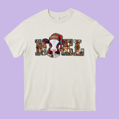 Western Christmas Baby Cow Noel Heavy Core Tee Designed By Jasminsmagicworld