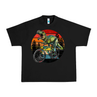 Black t rex dinosaur riding bicycle with retro forest sunset Urban Heavy Tee - RanaPortraitStore