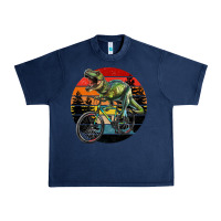 Navy t rex dinosaur riding bicycle with retro forest sunset Urban Heavy Tee - RanaPortraitStore