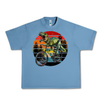 Pebble Blue t rex dinosaur riding bicycle with retro forest sunset Urban Heavy Tee - RanaPortraitStore