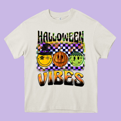 Halloween Vibes Smiley Face Heavy Core Tee Designed By Barkaloodesign