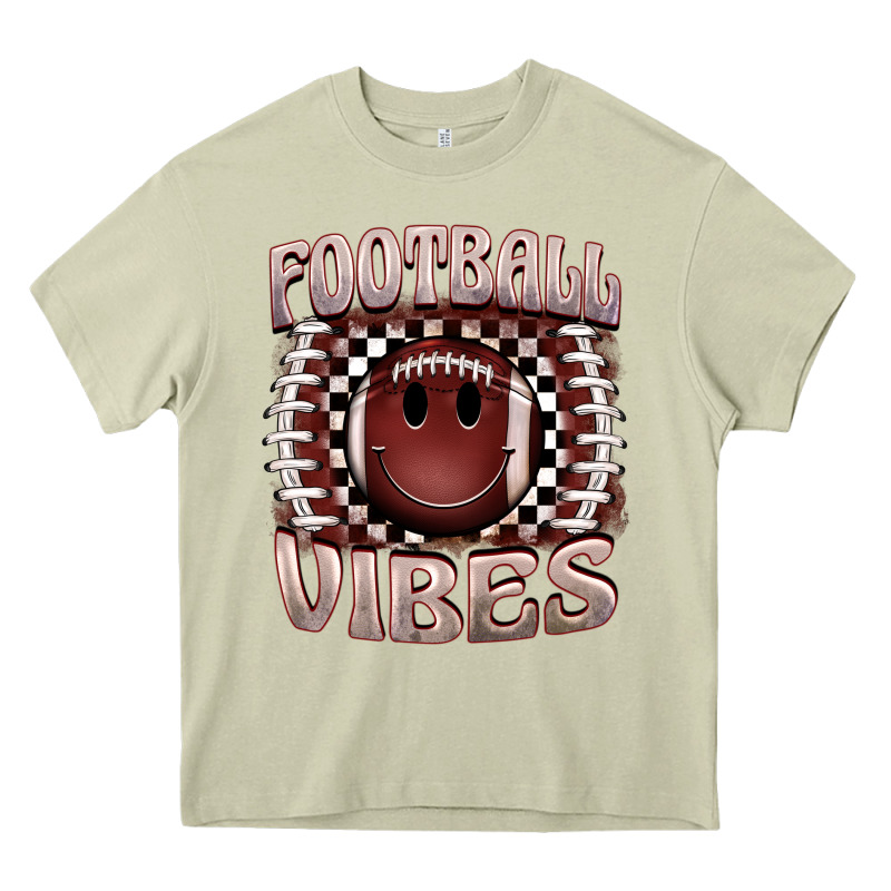Football Vibes Smiley Face Heavy Core Tee by BarkalooDesign | Teevron