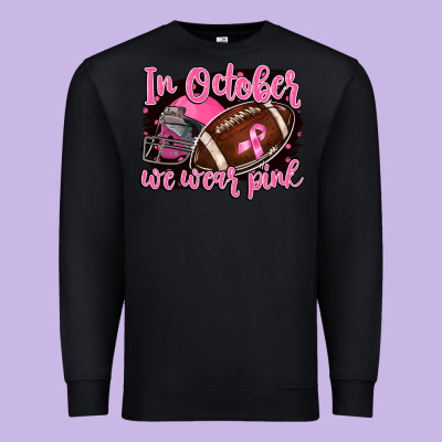 In October We Wear Pink With Football Premium Sweatshirt Designed By Barkaloodesign