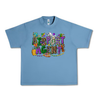 Pebble Blue airport agent mardi gras Urban Heavy Tee - CowGirlArtShop