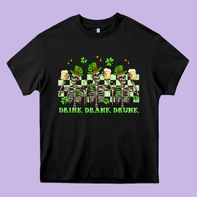 St. Patrick's Day Skeletons Drink Drank Drunk Heavy Core Tee Designed By Artiststas