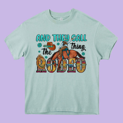 And They Call The Thing Rodeo Heavy Core Tee Designed By Artiststas