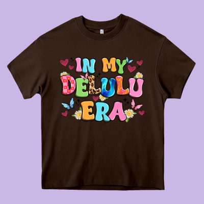 In My Delulu Era Heavy Core Tee Designed By Artiststas