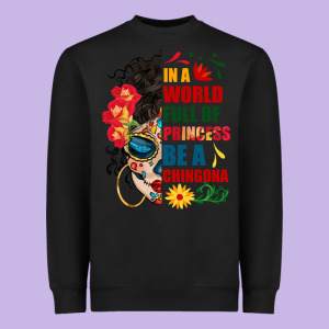 In A World Full Of Princess Be A Chingona Heavyweight Sweatshirt Designed By Bundleandbundleshop