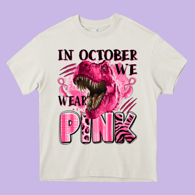 In October We Wear Pink Dinosaur Heavy Core Tee Designed By Lillyallendesigns