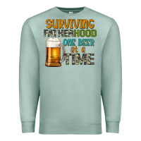 Seafoam surviving fatherhood one beer at a  time Premium Sweatshirt - Artiststas