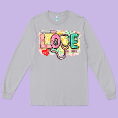 Love Nursing Leopard Background Long Sleeve Tee Designed By Cowgirlartshop