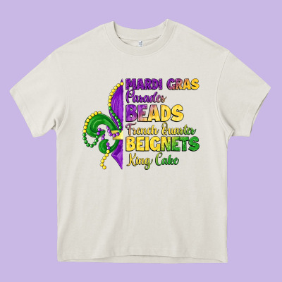 Mardi Gras Parades Beads French Quarter Beignets K Heavy Core Tee Designed By Lillyallendesigns