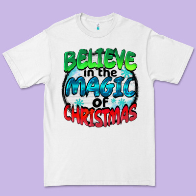 Believe In The Magic Of Christmas Premium Tee Designed By Barkaloodesign