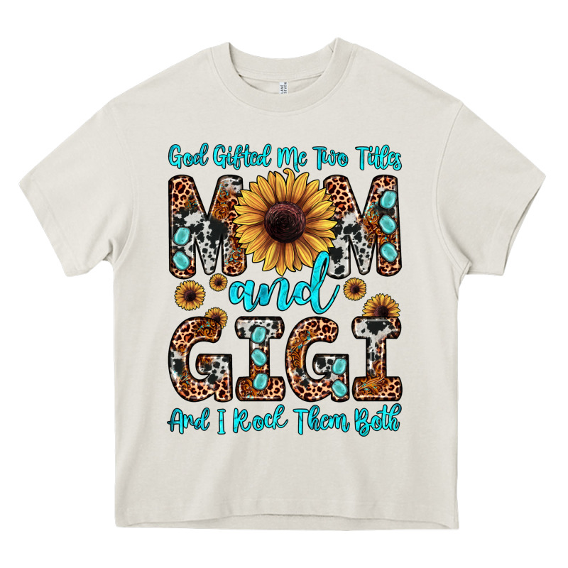 God Gifted Me Two Titles Mom And Gigi  And I Rock Them Both Heavy Core Tee by JahusDesignShop | Teevron