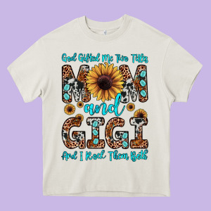 God Gifted Me Two Titles Mom And Gigi  And I Rock Them Both Heavy Core Tee Designed By Jahusdesignshop