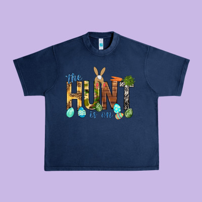 The Hunt Is On With Eggs Easter Day Urban Heavy Tee Designed By Howdyjamesfarm