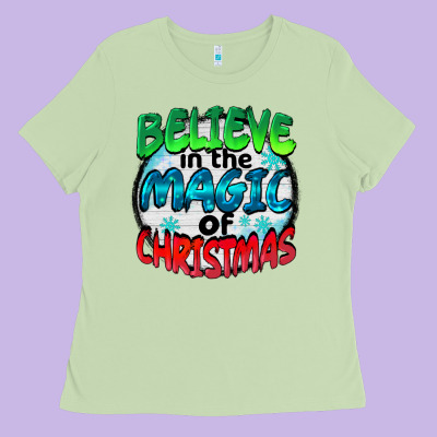 Believe In The Magic Of Christmas Ladies Tee Designed By Barkaloodesign