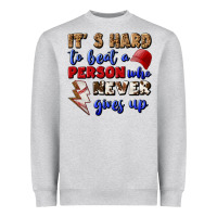 It's Hard To Beat A Person Who Never Gives Up Heavyweight Sweatshirt | Teevron