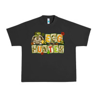 Pigment Black Egg hunter with camouflage plate letters Easter Urban Heavy Tee - HowdyJamesFarm