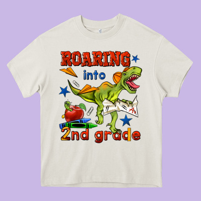 Roaring Into 2nd Grade Heavy Core Tee Designed By Bundleandbundleshop