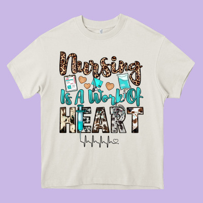 Nursing Is A Work Of Heart Heavy Core Tee Designed By Jahusdesignshop