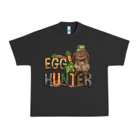 Pigment Black Egg hunter with rabbit Easter Day Urban Heavy Tee - HowdyJamesFarm