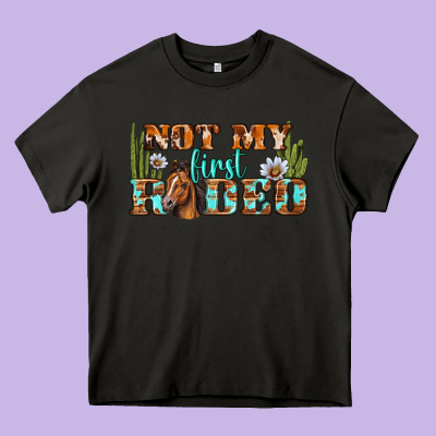 Not My First Rodeo Western Heavy Core Tee Designed By Bundleandbundleshop
