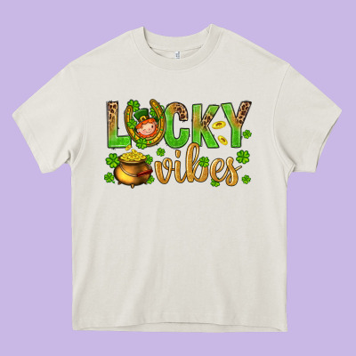 St. Patricks Day Lucky Vibes Heavy Core Tee Designed By Bundleandbundleshop