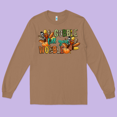 Gobble Till You Wobble Long Sleeve Tee Designed By Cowgirlartshop