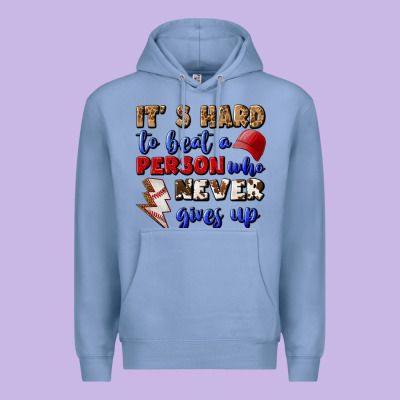 It's Hard To Beat A Person Who Never Gives Up Premium Hoodie Designed By Bundleandbundleshop