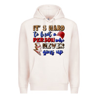Pale Pink It's Hard To Beat A Person Who Never Gives Up Premium Hoodie - BundleAndBundleShop