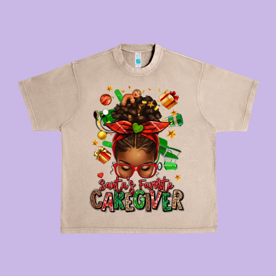 Santas Favorite Caregiver Afro Messy Bun Urban Heavy Tee Designed By Texasbilliewilder