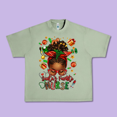 Santa's Favorite Nurse Afro Messy Bun Urban Heavy Tee Designed By Texasbilliewilder