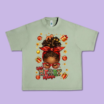 One Merry Mama Christmas Afro Messy Bun Urban Heavy Tee Designed By Texasbilliewilder