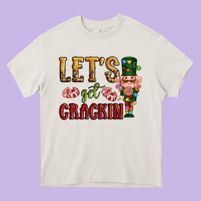 Let's Get Crackin Christmas Heavy Core Tee Designed By Nancycooperartshop