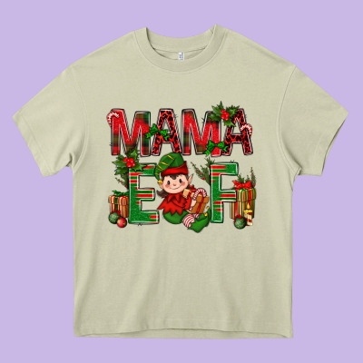 Mama Elf With Gift Christmas Heavy Core Tee Designed By Nancycooperartshop