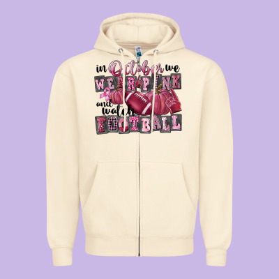In October We Wear Pink And Watch Football Zipper Hoodie Designed By Fadigitalartstudio
