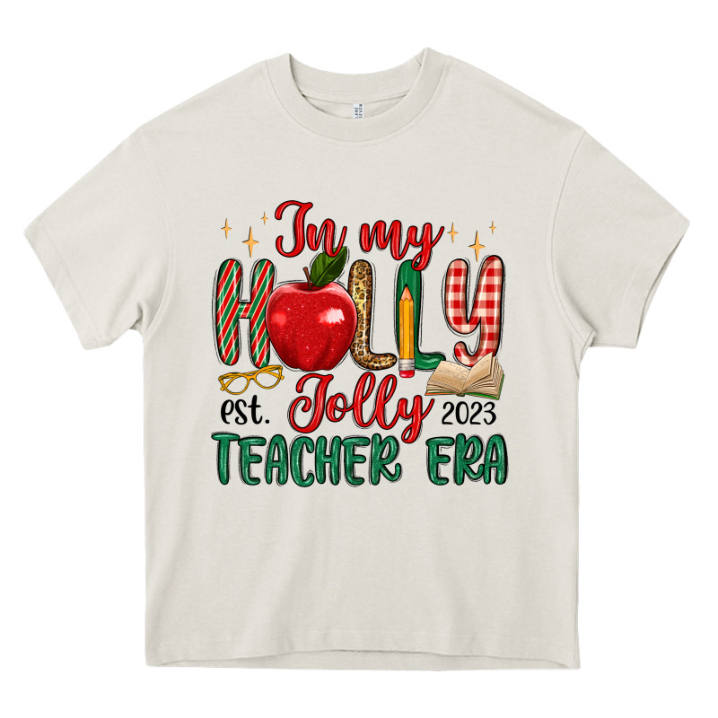 In My Holly Jolly Teacher Era Heavy Core Tee by MaliasSmallBusiness | Teevron