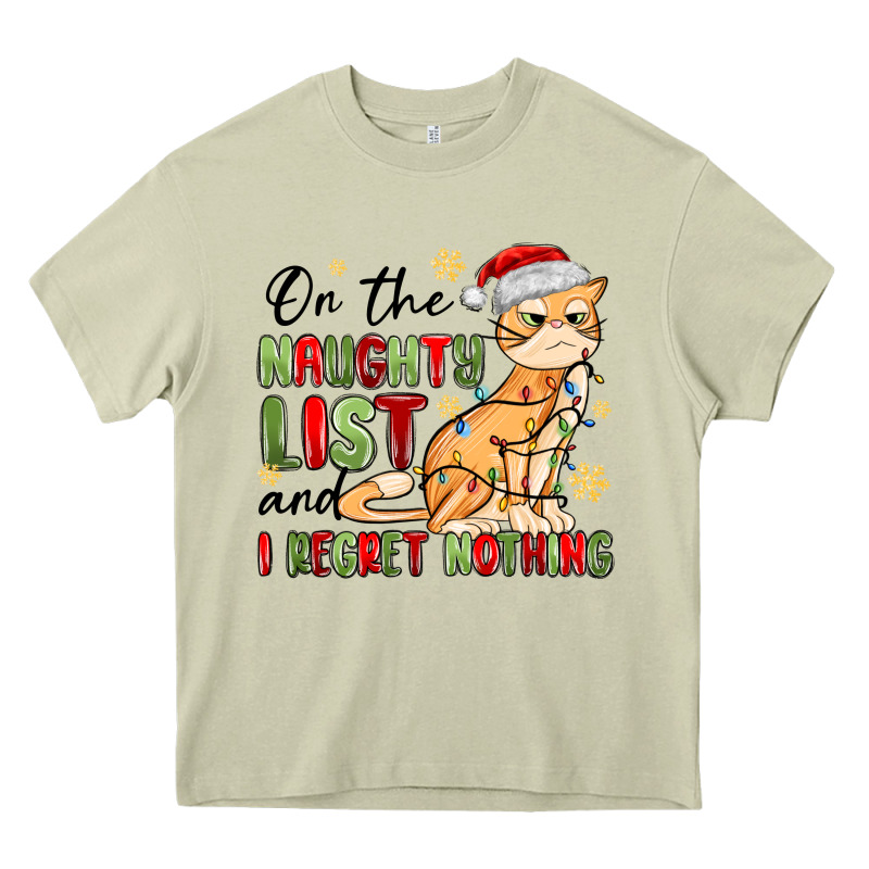 On The Naughty List And I Regret Nothing Heavy Core Tee by MaliasSmallBusiness | Teevron