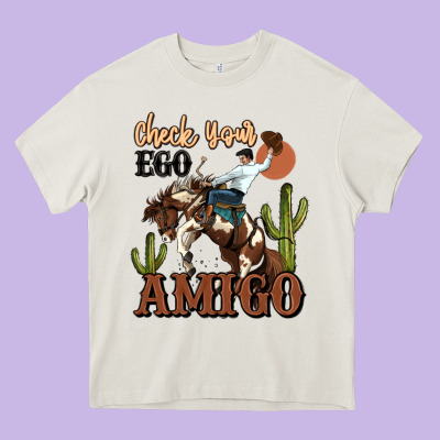 Check Your Ego Amigo Rodeo Cowboy Heavy Core Tee Designed By Maliassmallbusiness